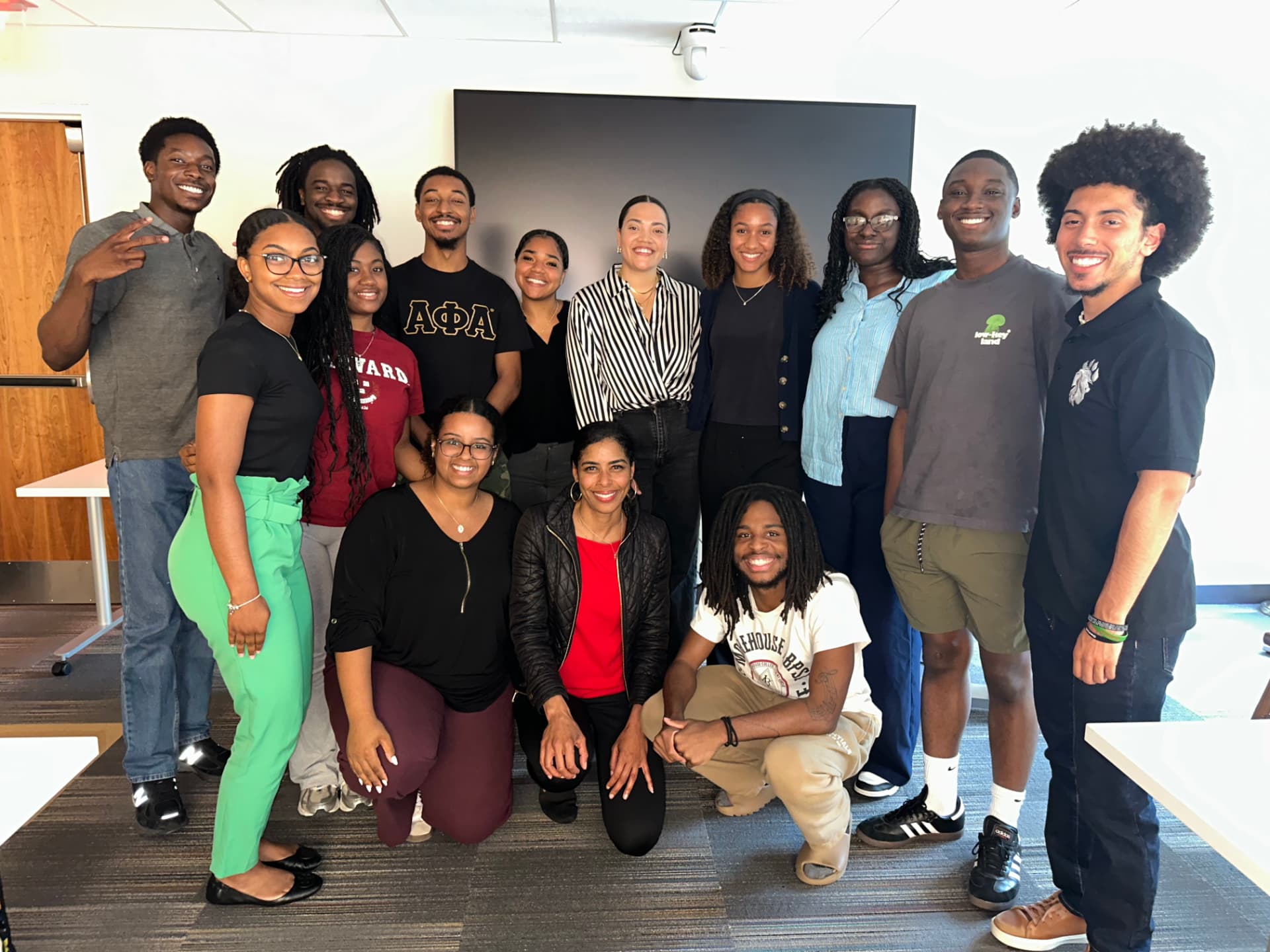 Tiana with a student cohort after a program session