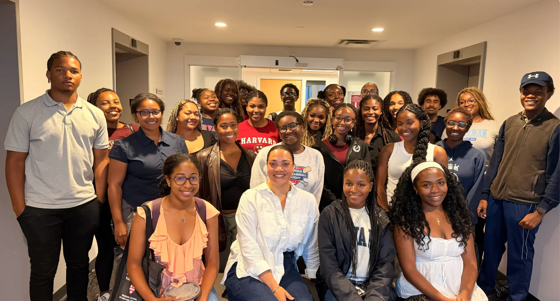 Tiana with a large group of students after a campus program